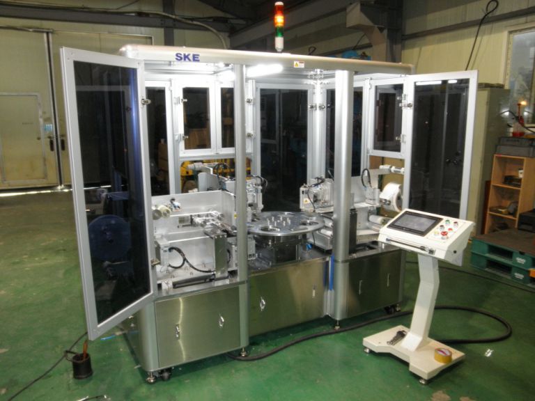 테이프 자동부착기